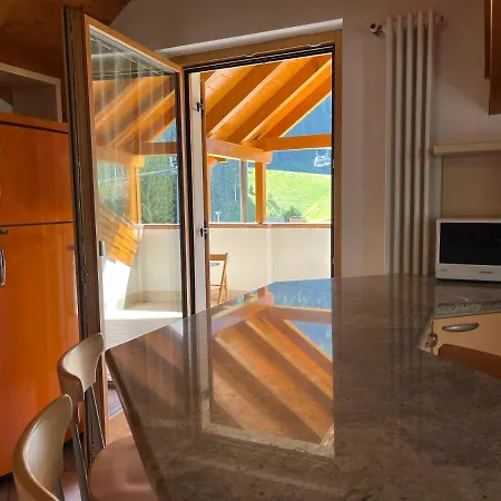 Attico In Legno Ad *